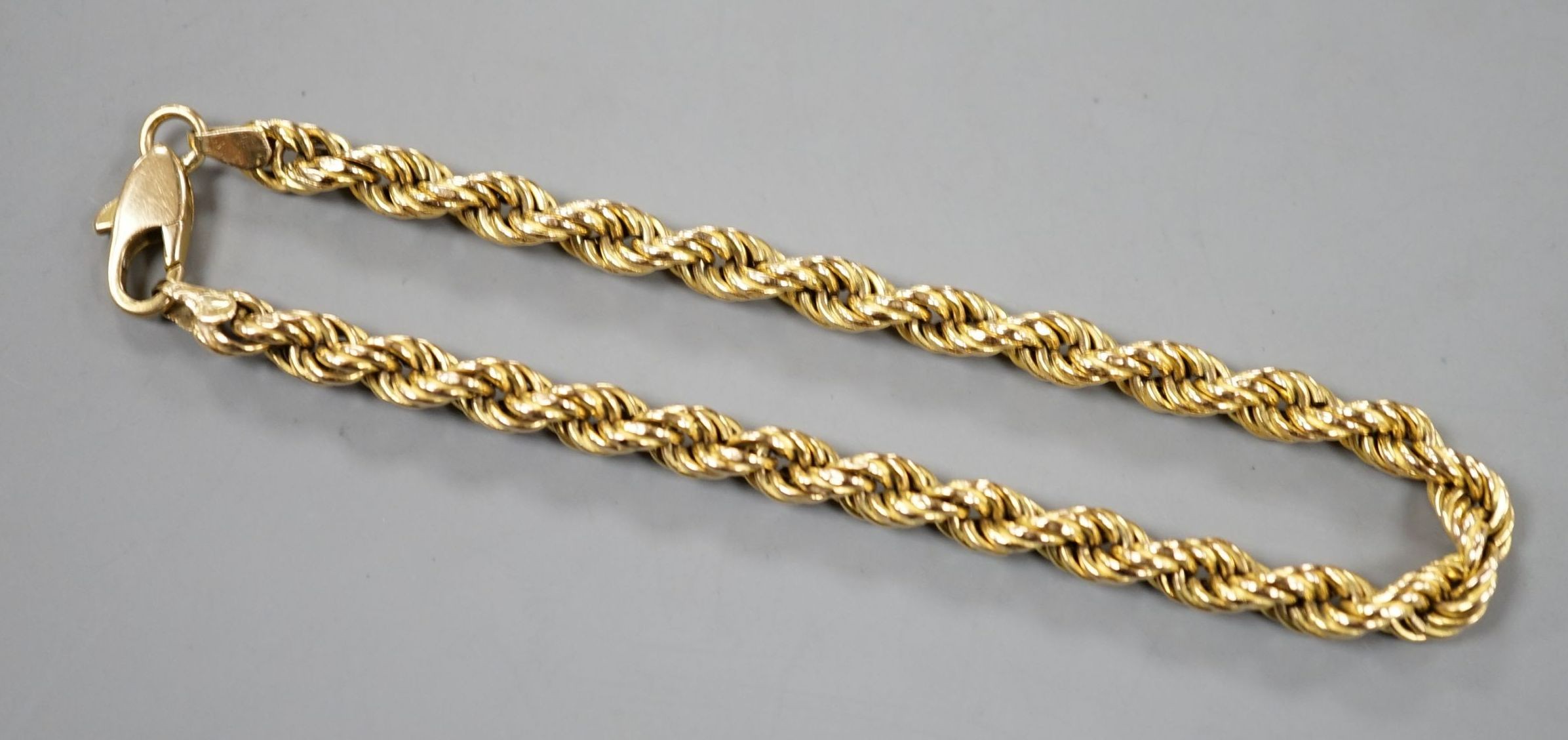 A modern 585 yellow metal rope twist bracelet, 19cm
